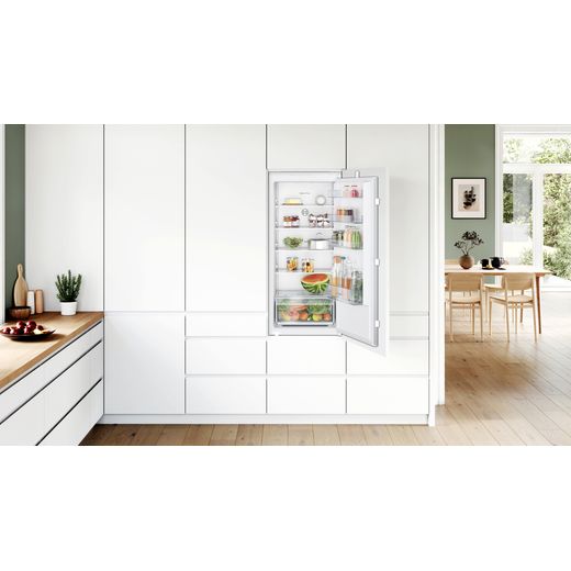 Bosch Series 2 KIR41NSE0G Integrated Upright Fridge - White - Fridge in kitchen cupboard shot
